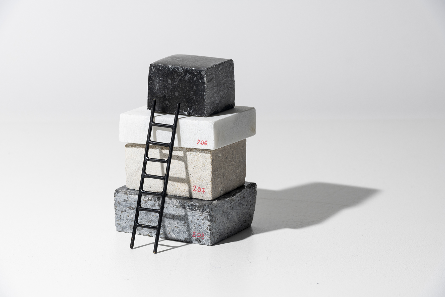 Stack Sample, 2018, marble and patinated bronze under antique glass dome, 22 x 22 x 22cm rel=